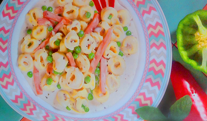 Tortellini con champiñones y jamón